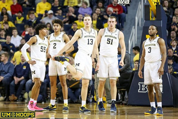 Eli Brooks (55), Jordan Poole (2), Ignas Brazdeikis (13), Austin Davis (51), and Zavier Simpson (3)