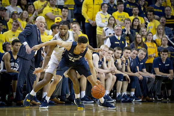 Zavier Simpson (3) and Penn State Head Coach Patrick Chambers