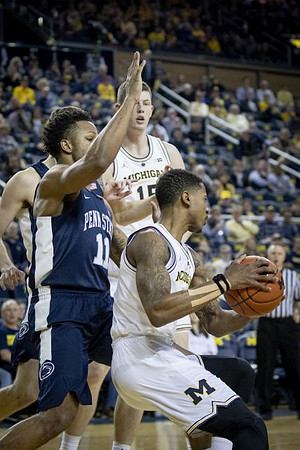 Charles Matthews (1) and Jon Teske (15)