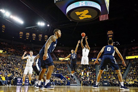 Jon Teske (15) and Charles Matthews (1)