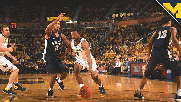 Austin Davis (51) and Zavier Simpson (3)