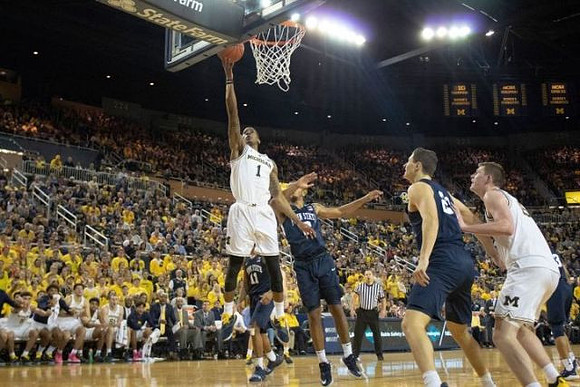Charles Matthews (1) and Jon Teske (15)
