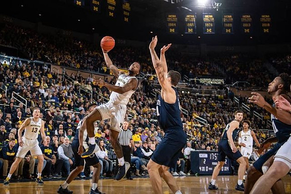 Ignas Brazdeikis (13), Zavier Simpson (3), and Jordan Poole (2)