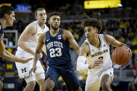 Austin Davis (51) and Jordan Poole (2)