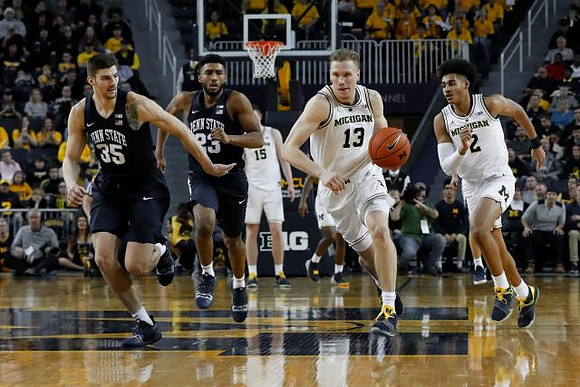 Ignas Brazdeikis (13), Jordan Poole (2), and Jon Teske (15)