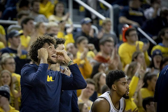 Isaiah Livers (4), Brandon Johns Jr. (23), and David DeJulius (0)