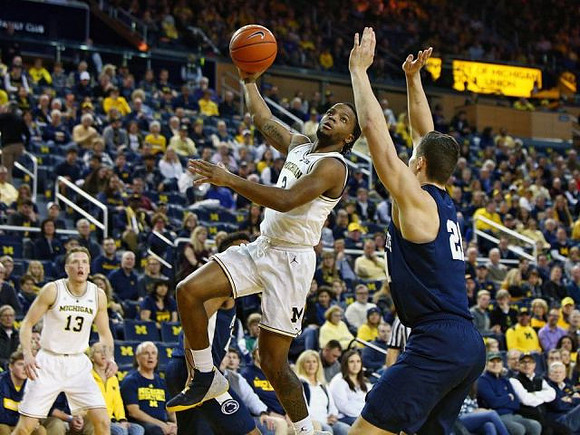 Ignas Brazdeikis (13) and Zavier Simpson (3)