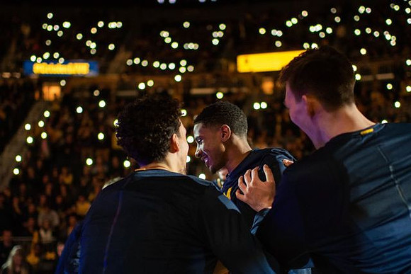 Brandon Johns Jr. (23), Charles Matthews (1), and Jon Teske (15)