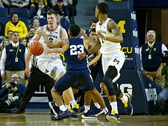 Jon Teske (15) and Charles Matthews (1)