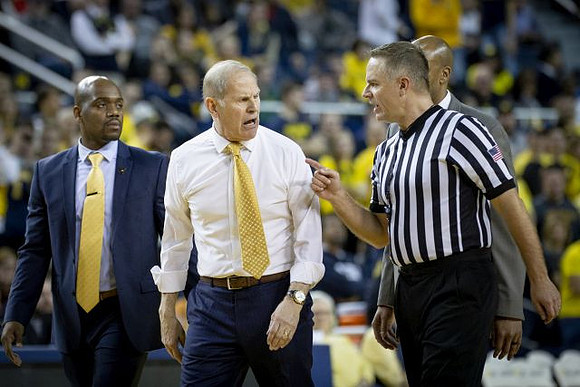 Deandre Haynes, John Beilein, and Saddi Washington