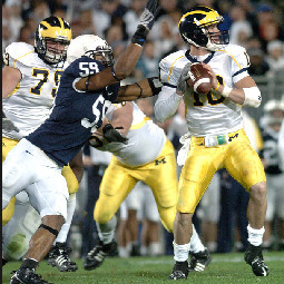 Steven Threet (10), Perry Dorrestein (79), and David Molk (50)