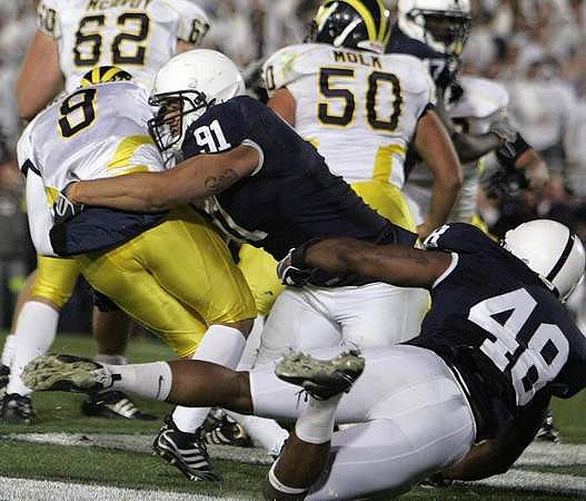 Tim McAvoy (62), David Molk (50), and Nick Sheridan (8)