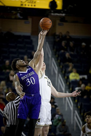 Jon Teske (15) and Jordan Poole (2)