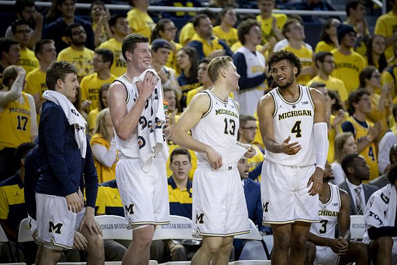 Luke Wilson (32), Jon Teske (15), Ignas Brazdeikis (13), and Isaiah Livers (4)