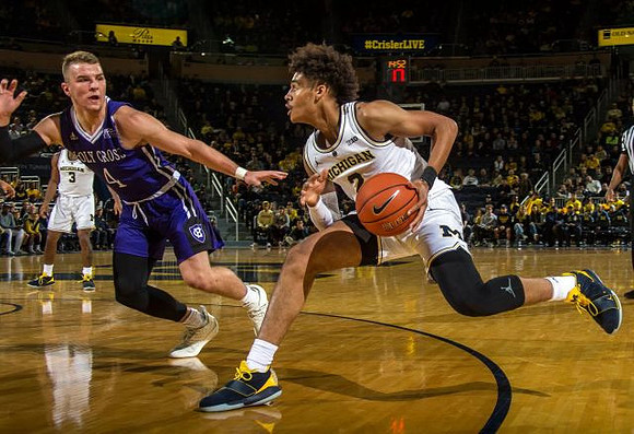 Zavier Simpson (3) and Jordan Poole (2)