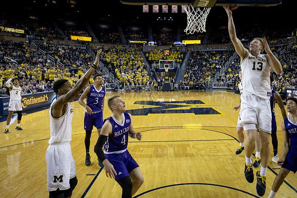 Jordan Poole (2), Charles Matthews (1), Jon Teske (15), and Ignas Brazdeikis (13)