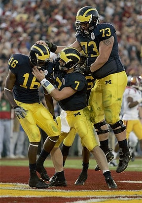 Adrian Arrington, Chad Henne, Mario Manningham, and Alex Mitchell