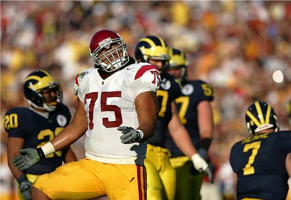 Michael Hart, Jake Long, Adam Kraus, and Chad Henne