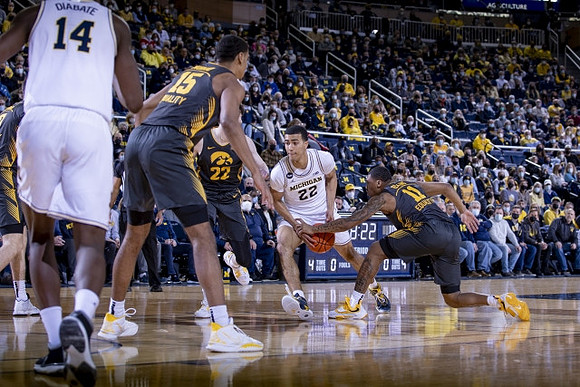 Moussa Diabate (14) and Caleb Houstan (22)