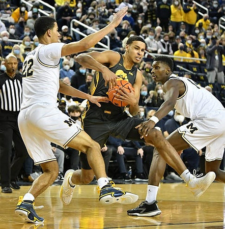 Caleb Houstan (22) and Moussa Diabate (14)