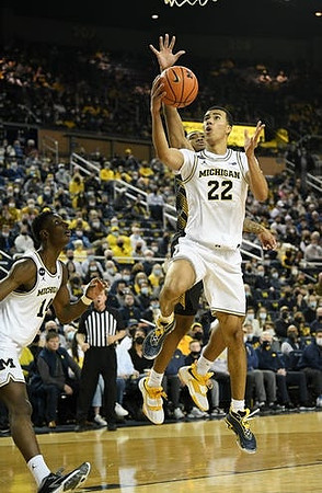 Moussa Diabate (14) and Caleb Houstan (22)