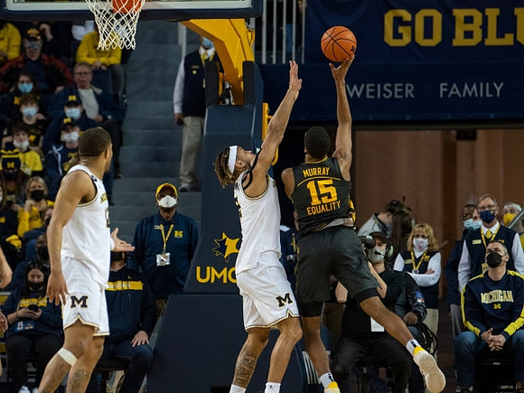 DeVante' Jones (12) and Terrance Williams II (5)