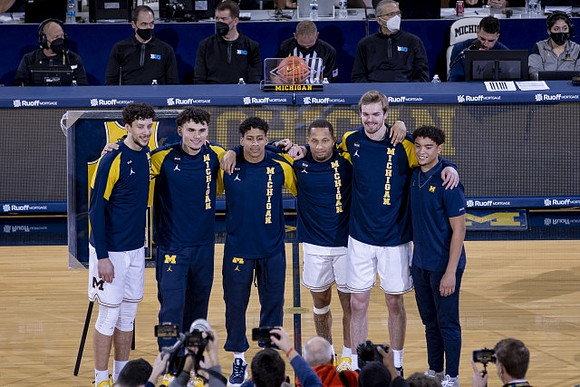 Brandon Johns Jr. (23), Adrien Nunez (0), Eli Brooks (55), DeVante' Jones (12), Jaron Faulds (44), Brandon Wade (4), and Senior Night