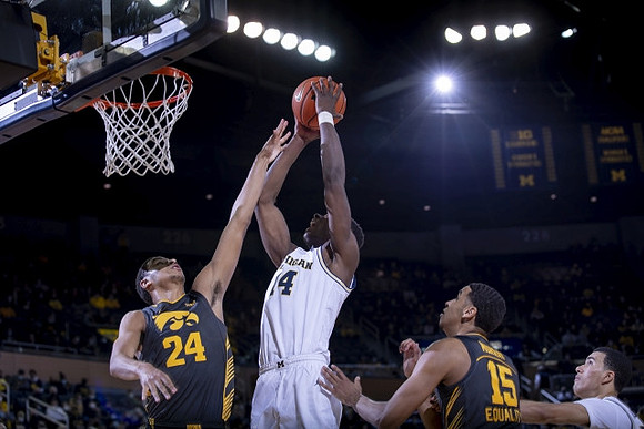 Moussa Diabate (14) and Caleb Houstan (22)