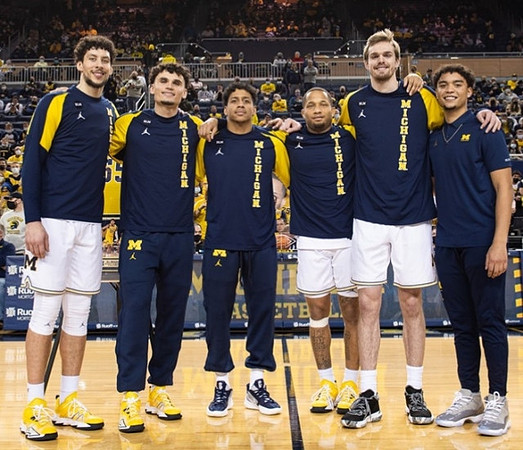 Brandon Johns Jr. (23), Adrien Nunez (0), Eli Brooks (55), DeVante' Jones (12), Jaron Faulds (44), Brandon Wade (4), and Senior Night