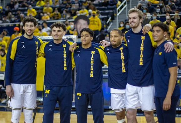 Brandon Johns Jr. (23), Adrien Nunez (0), Eli Brooks (55), DeVante' Jones (12), Jaron Faulds (44), Brandon Wade (4), and Senior Night