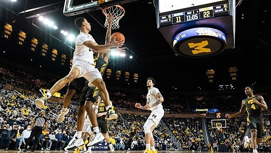 Caleb Houstan (22) and Brandon Johns Jr. (23)