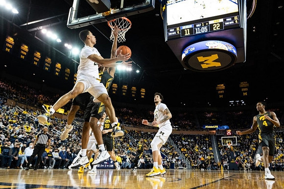 Caleb Houstan (22) and Brandon Johns Jr. (23)