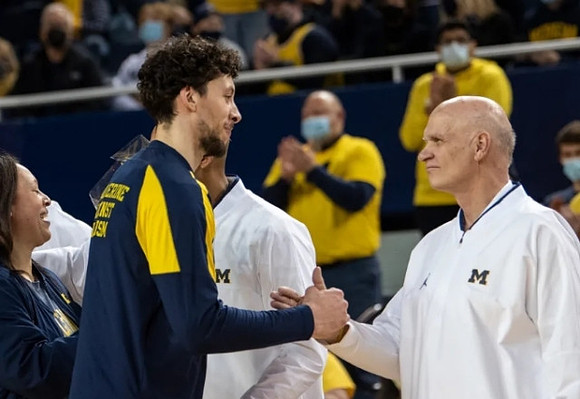 Brandon Johns Jr. (23) and Phil Martelli