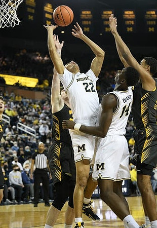Caleb Houstan (22) and Moussa Diabate (14)