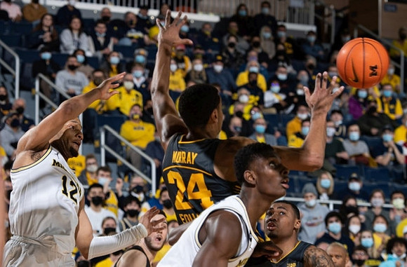 DeVante' Jones (12) and Moussa Diabate (14)