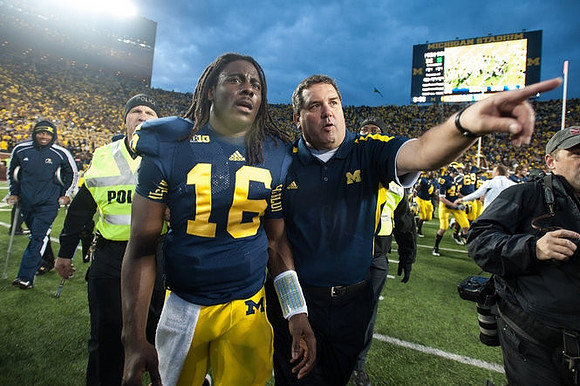 Denard Robinson (16) and Brady Hoke