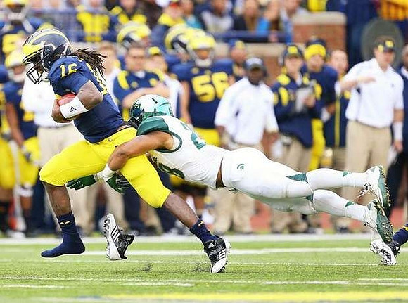 Denard Robinson (16)