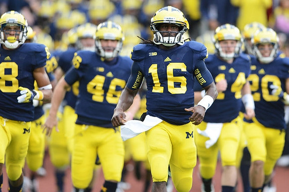 J.T. Floyd (8), Seth Broekhuizen (46), Denard Robinson (16), Jack Kennedy (14), and Steve Wilson (20)
