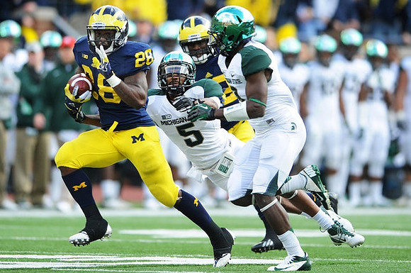 Fitzgerald Toussaint (28) and Ricky Barnum (52)
