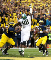 Denard Robinson (16) and Ricky Barnum (52)