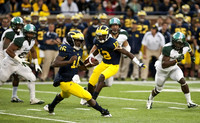 Denard Robinson (16) and Devin Gardner (12)