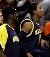 Anthony Wright (12) and Darius Morris (4)