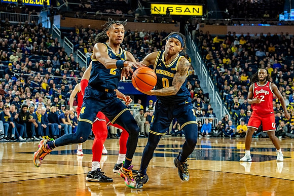 Kobe Bufkin (2) and Dug McDaniel (0)