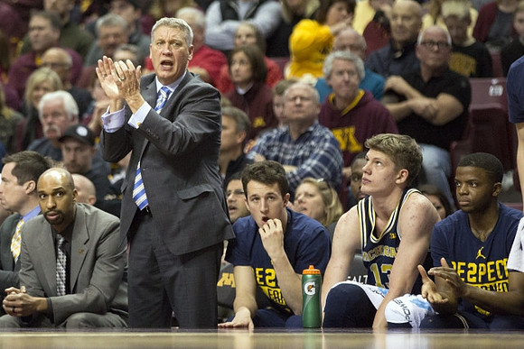Saddi Washington, Jeff Meyer, Andrew Dakich (11) , Moritz Wagner (13), and Xavier Simpson (3)