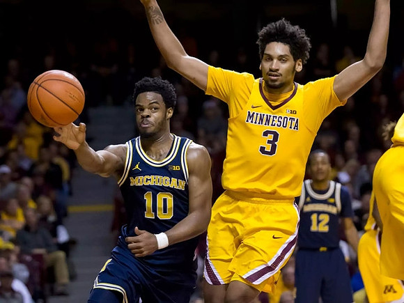 Derrick Walton Jr. (10) and Muhammad-Ali Abdur-Rahkman (12)