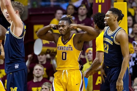 Moritz Wagner (13) and Zak Irvin (21)