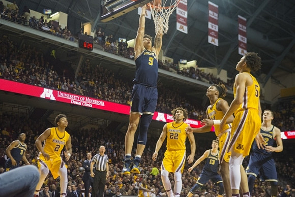 Xavier Simpson (3), Minnesota Head Coach Richard Pitino, D.J. Wilson (5), Moritz Wagner (13), and Duncan Robinson (22)