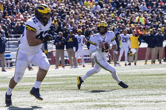 Ben Mason (42) and Shea Patterson (2)