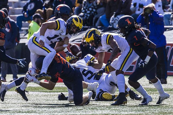 Tru Wilson (13), Jon Runyan Jr. (75), and Ronnie Bell (8)