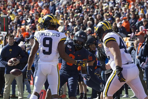 Donovan Peoples-Jones (9) and Ben Mason (42)
